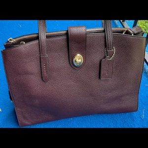 Never used Coach bag purple. (fall color)